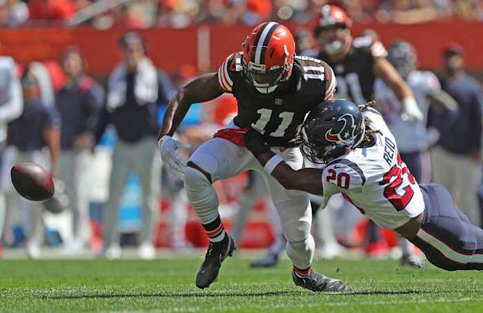 Cleveland Browns wide receiver Donovan Peoples-Jones (11) fumbles the ball as he is tackled by Houston Texans strong safety Justin Reid (20) during the first half of an NFL football game, Sunday, Sept. 19, 2021, in Cleveland, Ohio. [Jeff Lange/Beacon Journal] Browns 1